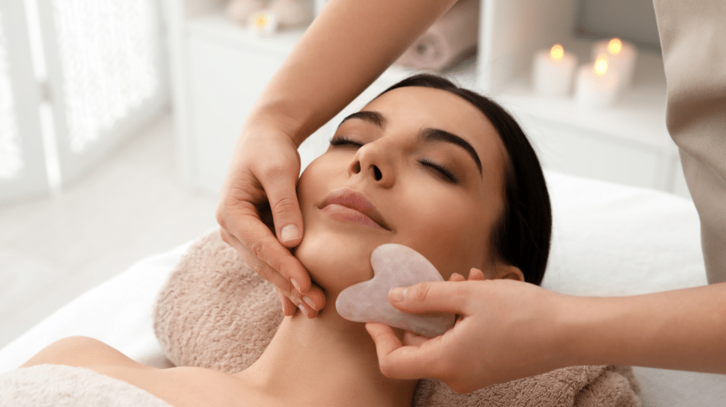 Facial gua sha massage on jawline to improve circulation and reduce tension naturally