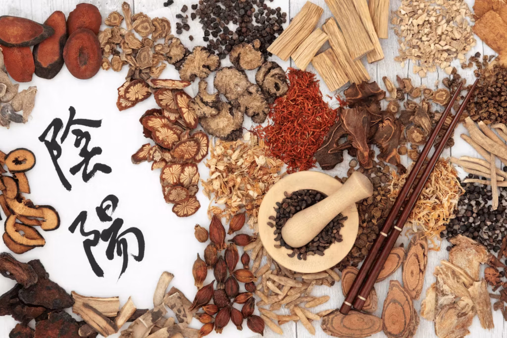 Traditional Chinese medicinal herbs arranged with calligraphy for digestive health